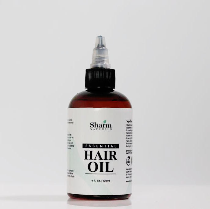 Sharm Naturals Essential Hair Oil — one clean, natural formula with five powerful uses for hair, scalp, beard, nails, and deep conditioning