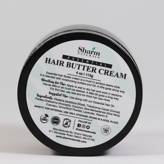A container of Essential Hair Butter Cream by Sharm Naturals, with product information and ingredients listed on the label.